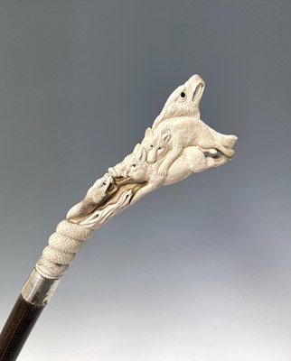 Lot 125 - A Japanese carved stag horn walking stick,...