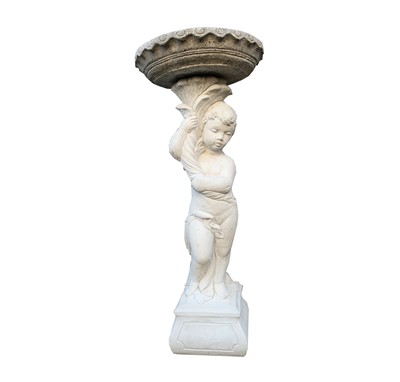 Lot 608 - A reconstituted stone bird bath modelled as a...