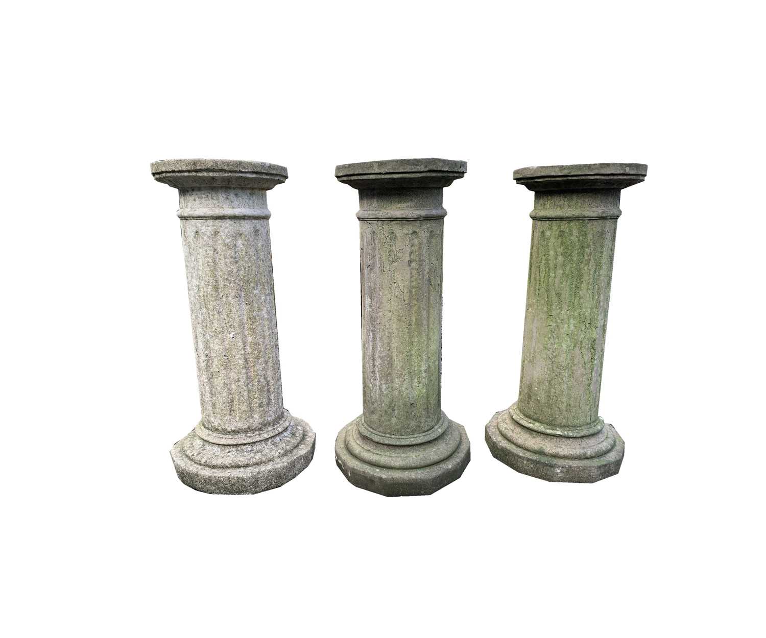 Lot 606 - Three reconstituted stone fluted columns....