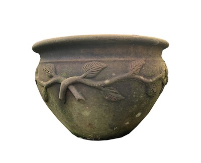 Lot 612 - A large terracotta pot with floral decoration....