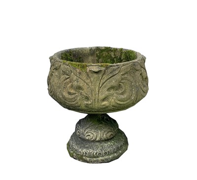 Lot 616 - A reconstituted stone pedestal planter with...