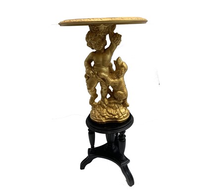 Lot 596 - A French gold painted table, the pedestal...