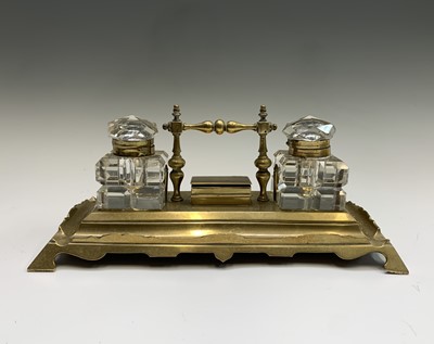 Lot 506 - A Victorian brass desk stand with two glass...