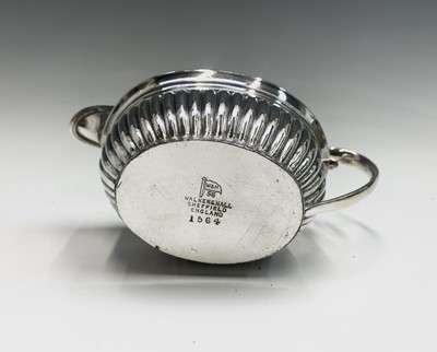 Lot 567 - A Walker and Hall silver plated four piece tea...