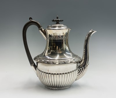 Lot 567 - A Walker and Hall silver plated four piece tea...