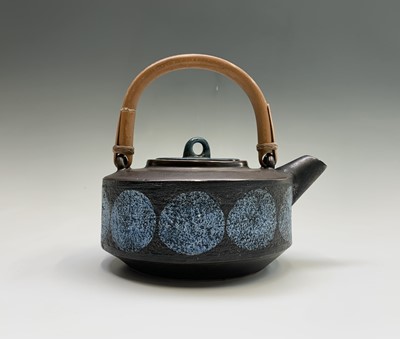 Lot 1004 - TROIKA POTTERY (1963-1983) Teapot with swing...