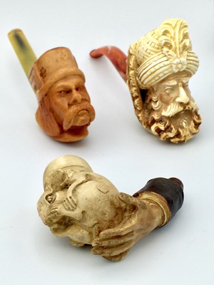 Lot 600D - A modern resin pipe, decorated with the head...