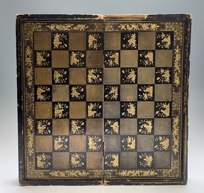 Lot 575 - A Chinese lacquer folding chess board, circa...