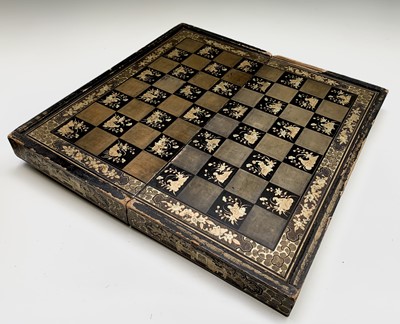 Lot 575 - A Chinese lacquer folding chess board, circa...