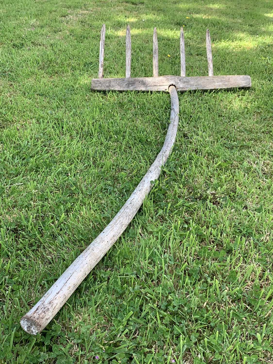 Wooden store hay rake