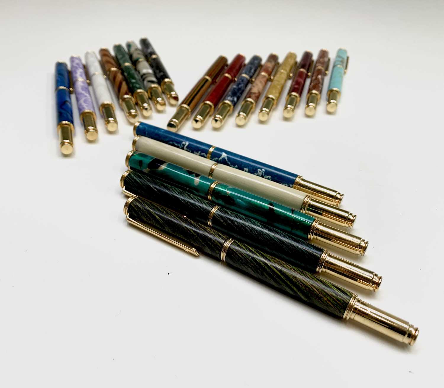 Lot 1119 - Twenty fountain pens, each has a German...