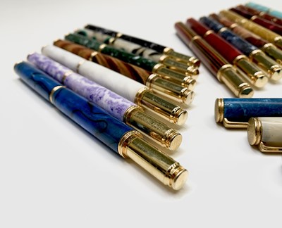 Lot 1119 - Twenty fountain pens, each has a German...