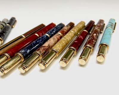 Lot 1119 - Twenty fountain pens, each has a German...