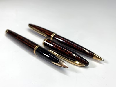 Lot 1127 - A Waterman Carene amber fountain pen with...