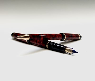 Lot 1134 - A red Waterman Phileas fountain pen and...