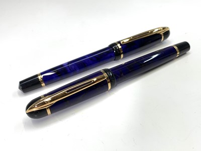 Lot 1135 - A blue Waterman Phileas fountain pen and...