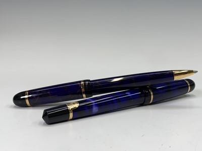 Lot 1137 - A green Waterman Phileas fountain pen and...