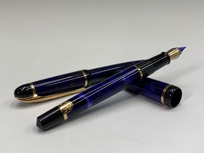 Lot 1137 - A green Waterman Phileas fountain pen and...