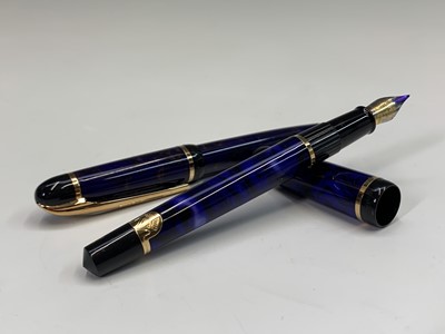 Lot 1137 - A green Waterman Phileas fountain pen and...