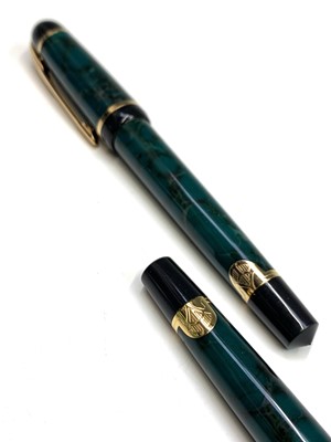 Lot 1138 - A green Waterman Phileas fountain pen and...