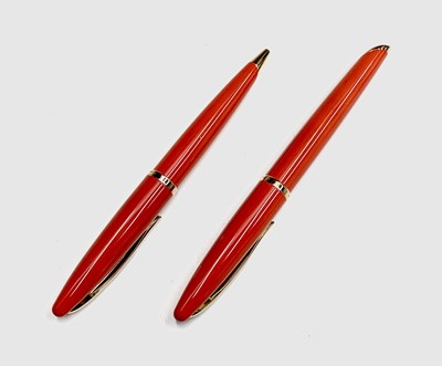 Lot 1142 - A Waterman Careine red fountain pen with 18ct...