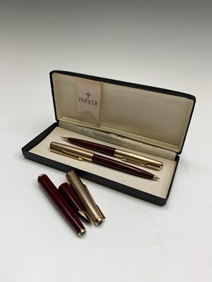 Lot 1149 - A Parker 65 Consort red fountain pen (barrel...