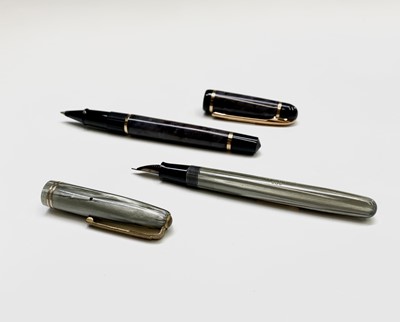 Lot 1150 - A Parker 503 striated pearl fountain pen with...