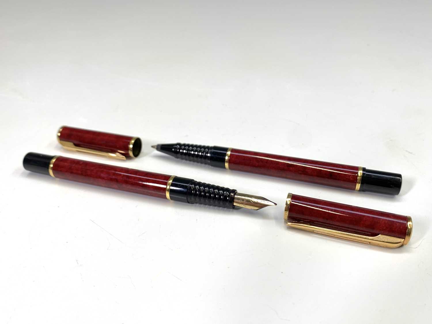 Lot 1156 - A Waterman Laureat Red fountain pen and...