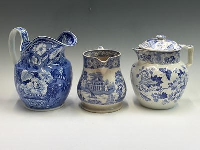 Lot 1134 - A large blue printed pearlware toast jug...