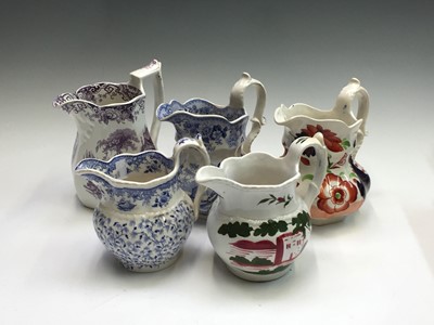 Lot 1138 - Five Cambrian pottery Swansea jugs, variously...