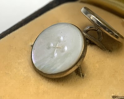 Lot 98 - A pair of mother of pearl cuff links in...