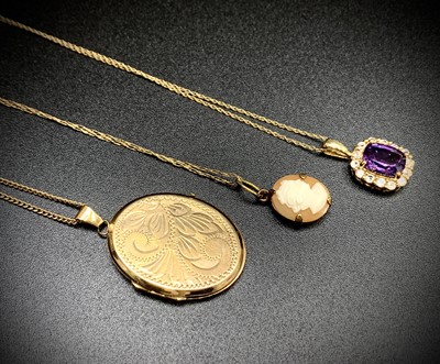 Lot 303 - A 9ct gold mounted amethyst and white stone...