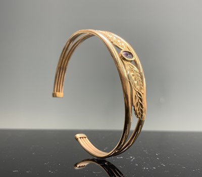 Lot 107 - A 9ct gold bracelet and a 9ct gold bangle set...