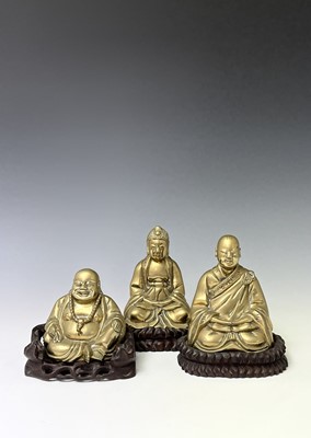 Lot 316 - Three Chinese brass buddahs, early 20th...