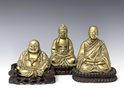 Lot 316 - Three Chinese brass buddahs, early 20th...