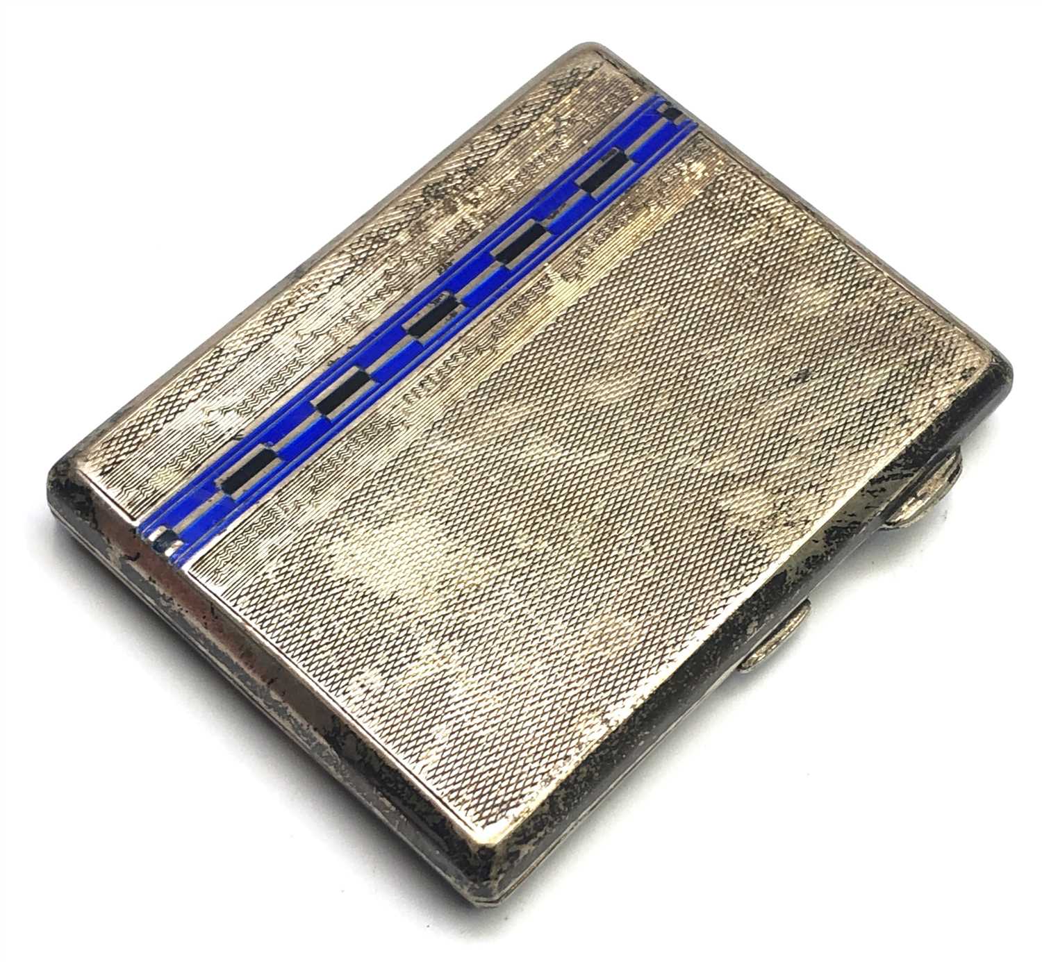 Lot 2707 - An engine turned silver and enamel cigarette...