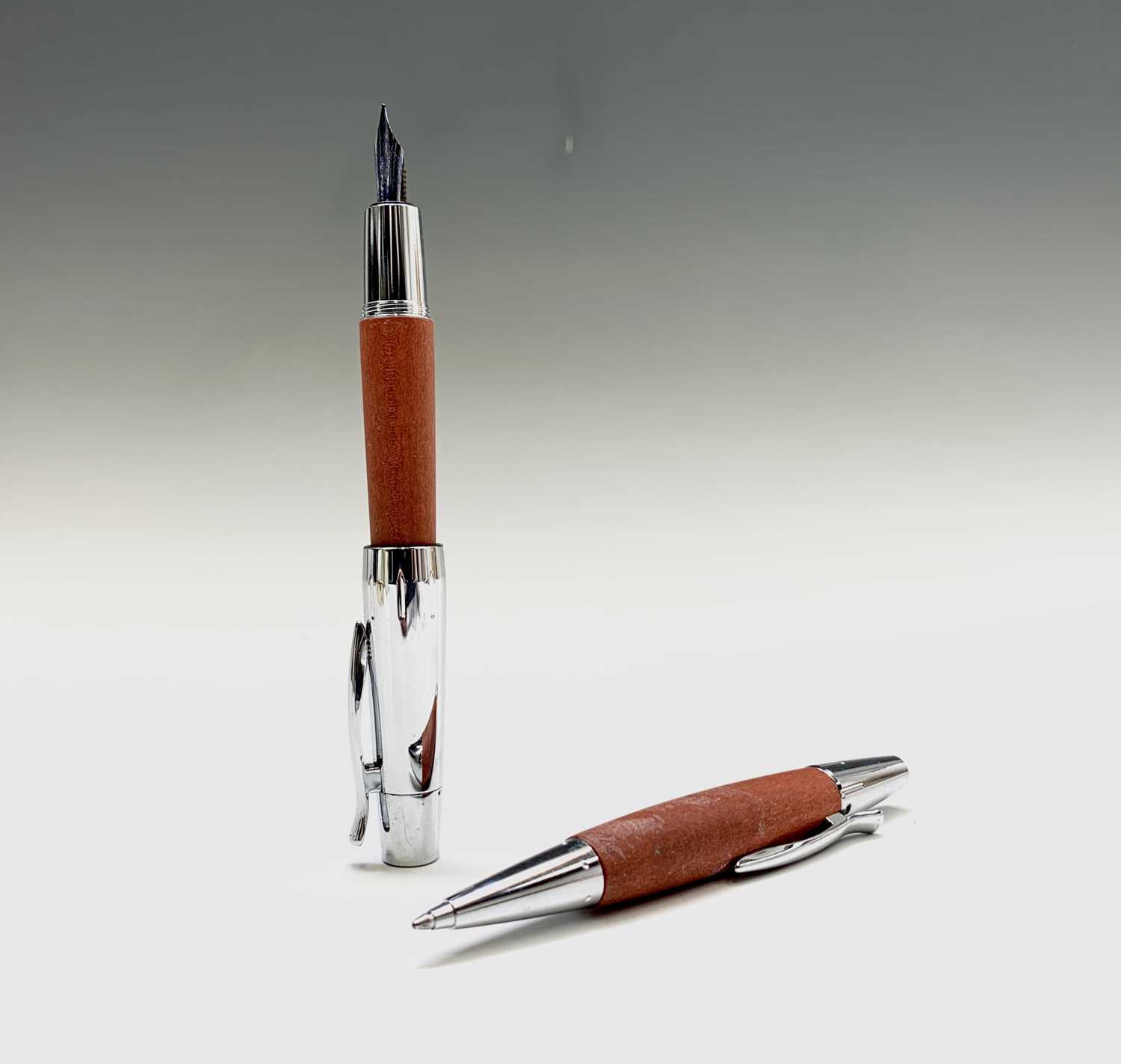 Lot 1196 - A Fabre Castell fountain pen with wood barrel...