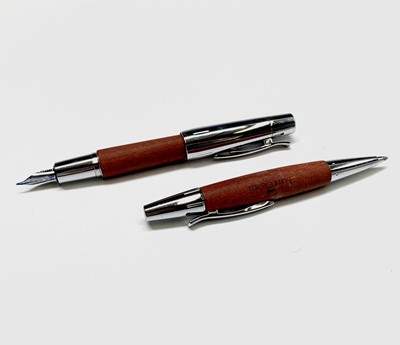 Lot 1196 - A Fabre Castell fountain pen with wood barrel...