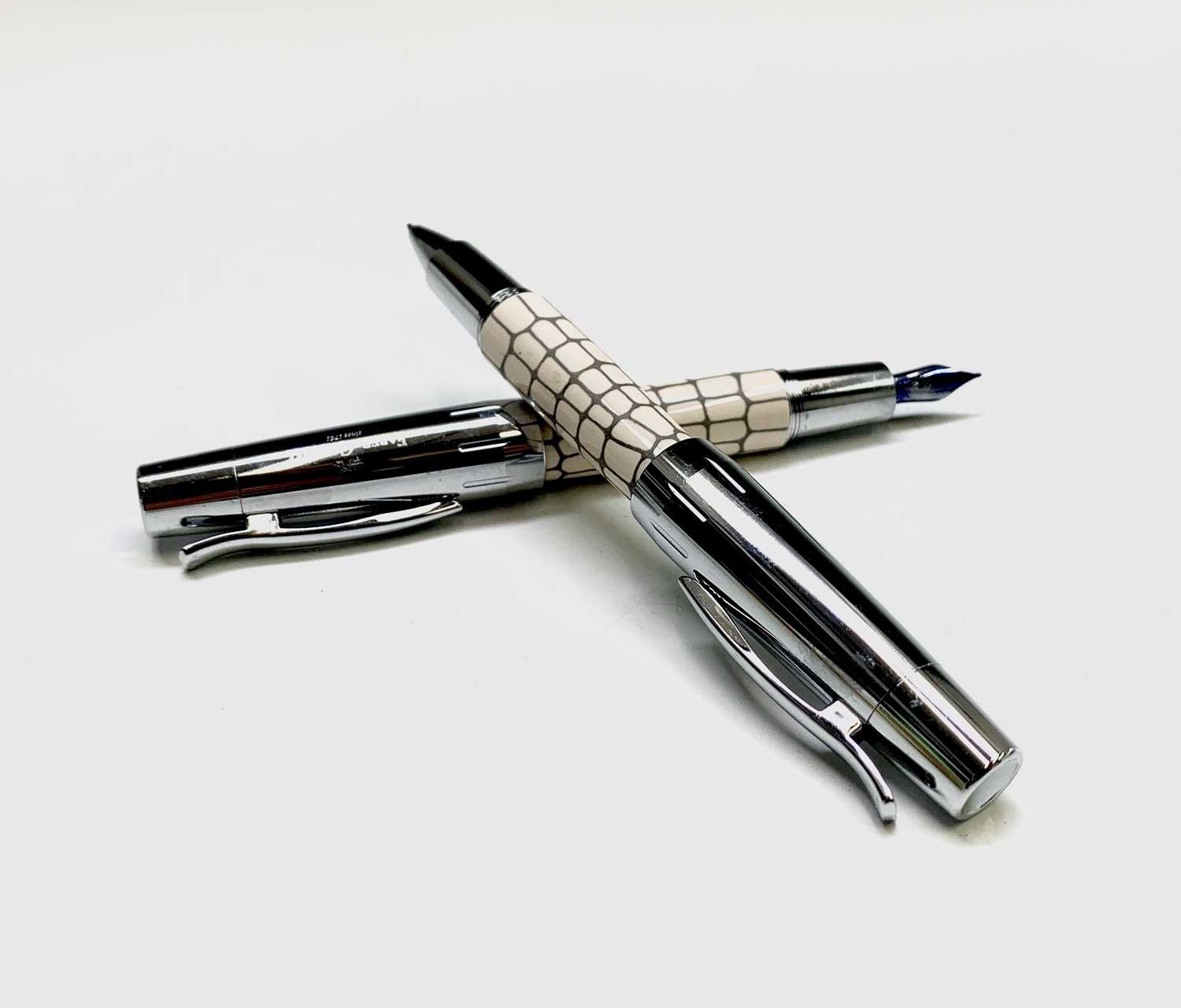 Lot 1197 - A Fabre Castell fountain pen in cream...