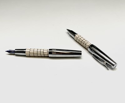 Lot 1197 - A Fabre Castell fountain pen in cream...