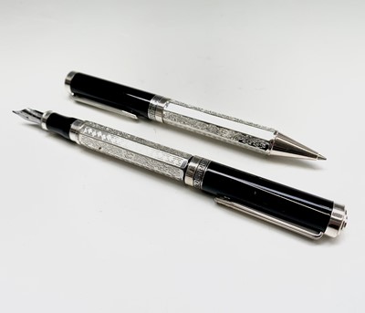 Lot 1202 - A Buckingham Palace fountain pen and matching...