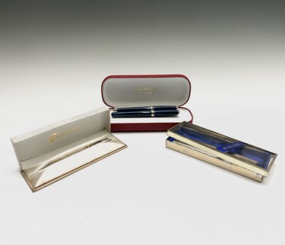 Lot 1212 - A Sheaffer Prelude dark blue fountain pen and...