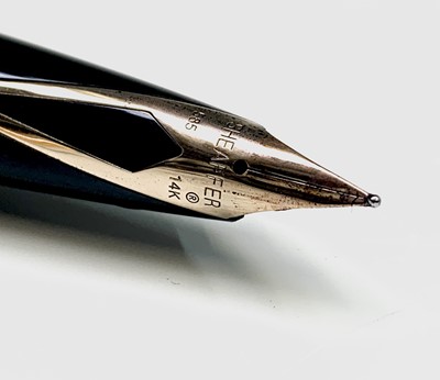 Lot 1226 - A Sheaffer Valor black fountain pen with gold...