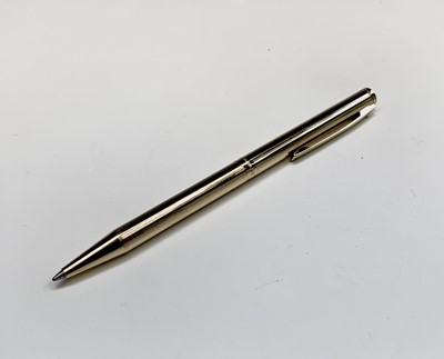 Lot 1230 - A Sheaffer Agio compact gold fountain pen and...