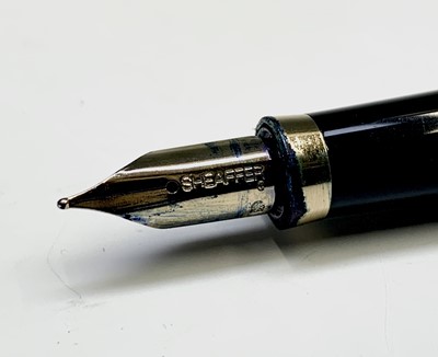 Lot 1230 - A Sheaffer Agio compact gold fountain pen and...