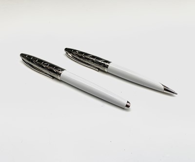 Lot 1236 - A Waterman Carene Delux white and palladian...