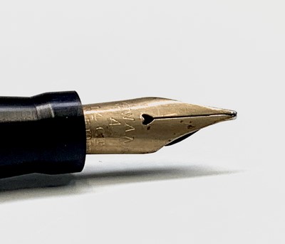 Lot 1244 - A black UHU fountain pen (lacks nib), a...