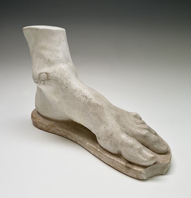 Lot 327 - After the antique, a cast plaster foot, 20th...