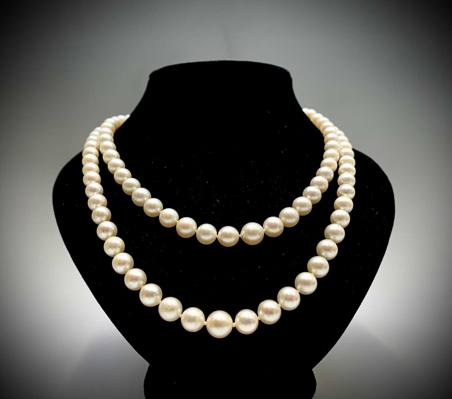 Lot 105 - An impressive double strand pearl necklace...