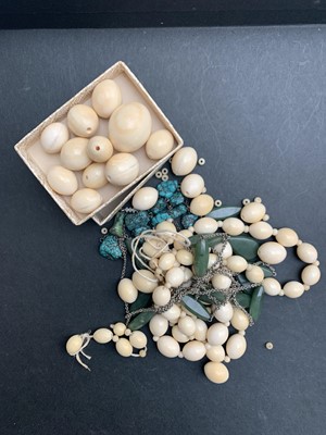 Lot 347 - Two ivory necklaces, a jade necklace and a...